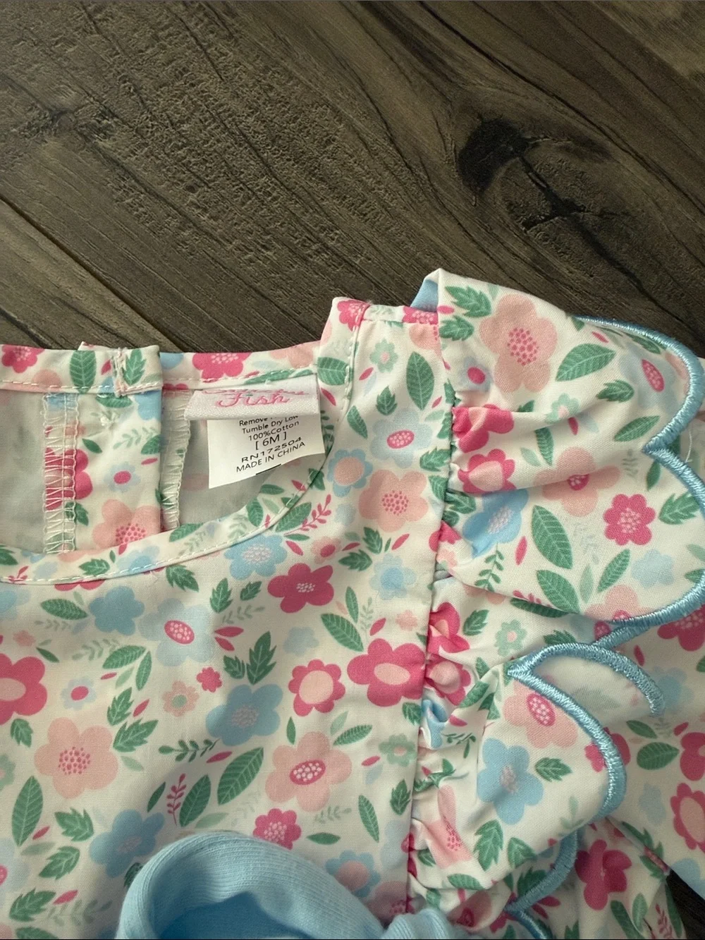 NEVER WORN Floral Baby One-Piece with Light Blue Bow Accents